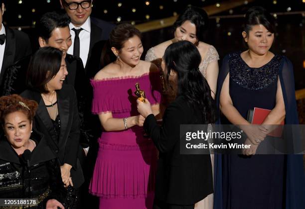 Miky Lee, Kwak Sin-ae, So-dam Park, interpreter Sharon Choi, and Hye-jin Jang accept the Best Picture award for 'Parasite' onstage during the 92nd...