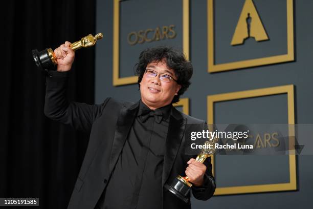 Bong Joon-ho, winner of the Original Screenplay, International Feature Film, Directing, and Best Picture award for “Parasite,” poses in the press...