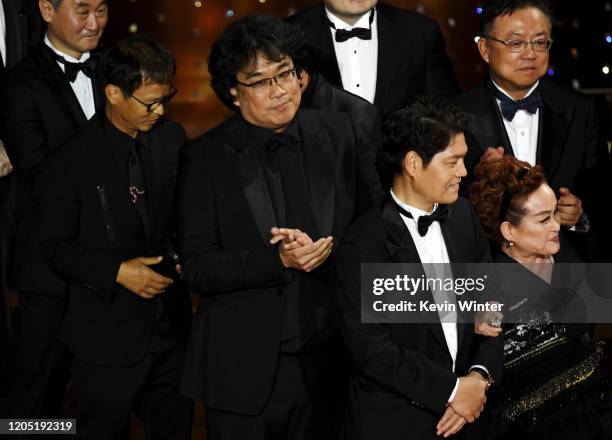 Writer-director Bong Joon-ho, executive producers Min Heoi Heo and Miky Lee accept the Best Picture award for "Parasite" during the 92nd Annual...