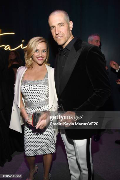 Reese Witherspoon and Jim Toth attend the 2020 Vanity Fair Oscar Party hosted by Radhika Jones at Wallis Annenberg Center for the Performing Arts on...