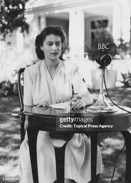 Princess Elizabeth makes a broadcast from the gardens of Government House in Cape Town, South Africa, on the occasion of her 21st birthday, 21st...