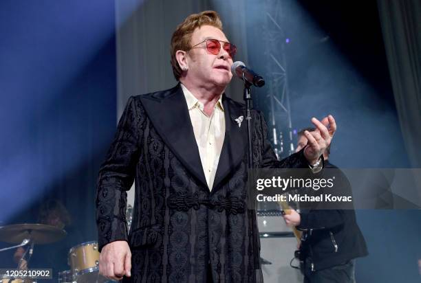 Elton John performs onstage at the 28th Annual Elton John AIDS Foundation Academy Awards Viewing Party sponsored by IMDb, Neuro Drinks and Walmart on...