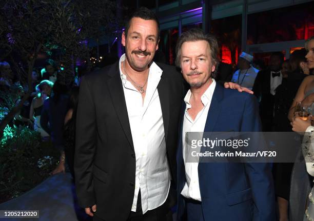 Adam Sandler and David Spade attend the 2020 Vanity Fair Oscar Party hosted by Radhika Jones at Wallis Annenberg Center for the Performing Arts on...