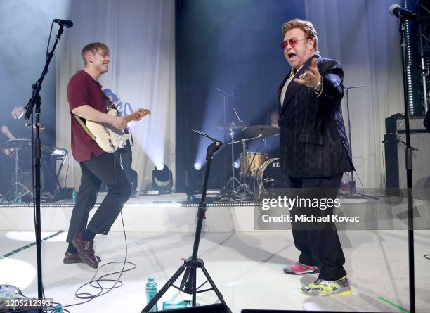 Sam Fender and Elton John perform at the 28th Annual Elton John AIDS Foundation Academy Awards Viewing Party sponsored by IMDb, Neuro Drinks and...