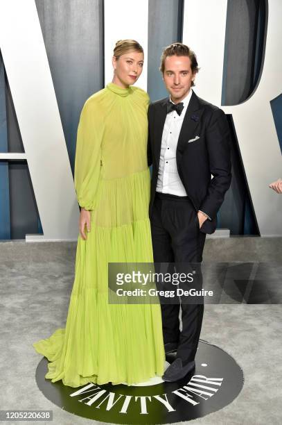 Maria Sharapova and Alexander Gilkes attend the 2020 Vanity Fair Oscar Party hosted by Radhika Jones at Wallis Annenberg Center for the Performing...