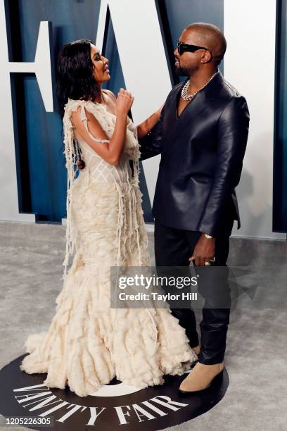 Kim Kardashian West and Kanye West attend the 2020 Vanity Fair Oscar Party at Wallis Annenberg Center for the Performing Arts on February 09, 2020 in...