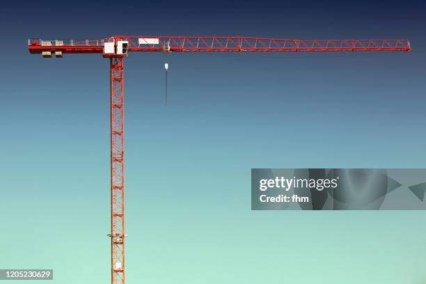 crane with sky (germany) - kran stock-fotos und bilder