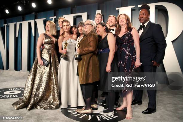 Filmmaker Carol Dysinger and director Elena Andreicheva pose with the Oscar for Best Short Subject Documentary for "Learning to Skateboard in a...