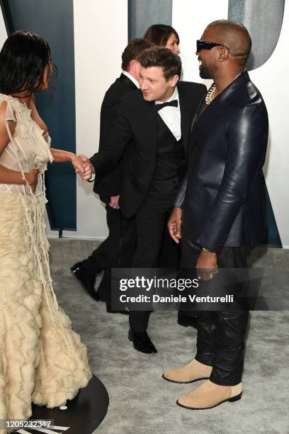 Kim Kardashian, Jeremy Renner and Kanye West attend the 2020 Vanity Fair Oscar party hosted by Radhika Jones at Wallis Annenberg Center for the...