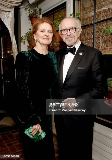 Kate Fahy and Jonathan Pryce attend the 2020 Netflix Oscar After Party at San Vicente Bugalows on February 09, 2020 in West Hollywood, California.