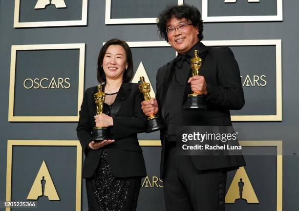 Kwak Sin-ae and Bong Joon-ho, winners of the Best Picture, Director, Original Screenplay, and International Feature Film awards for "Parasite," pose...