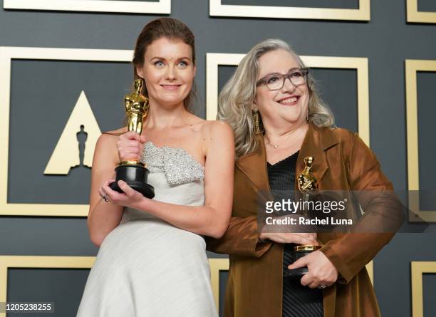 Carol Dysinger and Elena Andreicheva, winners of the Documentary Short Subject award for “Learning to Skateboard in a Warzone ,” pose in the press...