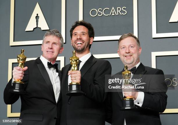 Dominic Tuohy, Guillaume Rocheron and Greg Butler, winners of the Visual Effects award for "1917," pose in the press room during the 92nd Annual...