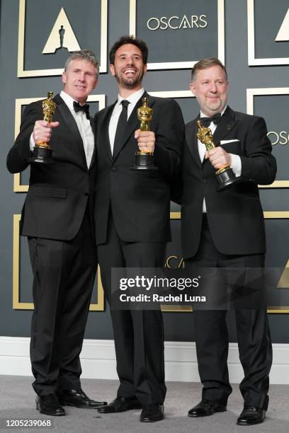 Dominic Tuohy, Guillaume Rocheron and Greg Butler, winners of the Visual Effects award for "1917," pose in the press room during the 92nd Annual...