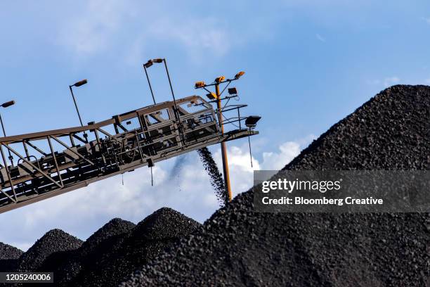 manganese ore stock pile - mining low angle foto e immagini stock