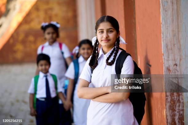 school children at campus - girls stock pictures, royalty-free photos & images
