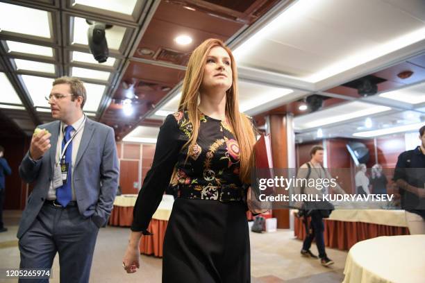 Presenter Maria Butina speaks with journalists as "World of Tanks" online game co-creator Vyacheslav Makarov launches his political party - the...