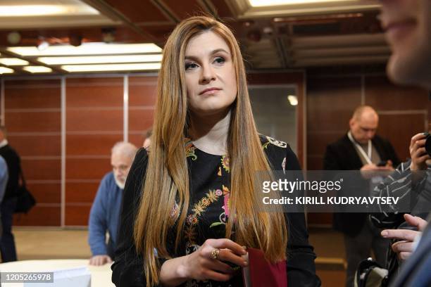 Presenter Maria Butina speaks with journalists as "World of Tanks" online game co-creator Vyacheslav Makarov launches his political party - the...