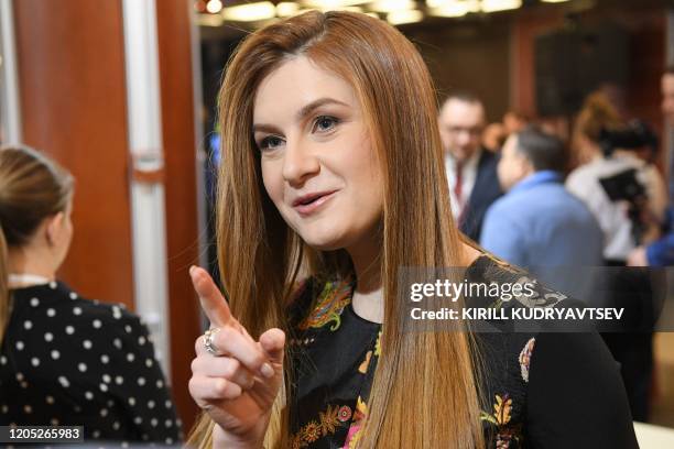 Presenter Maria Butina speaks with journalists as "World of Tanks" online game co-creator Vyacheslav Makarov launches his political party - the...