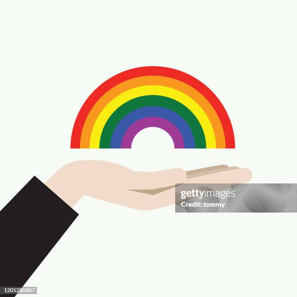 ilustraciones, imágenes clip art, dibujos animados e iconos de stock de mano sosteniendo un símbolo de arco iris - estereotipo de géneros