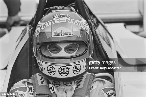 Finnish Formula One racing driver Keke Rosberg, driver with the Williams Formula One team, at the wheel of his race car during testing of the new...