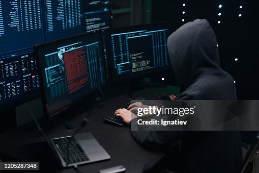 Hacker Coding Pic Computer Hacker Coding On Keyboard On A Background Of Monitors High-Res ...