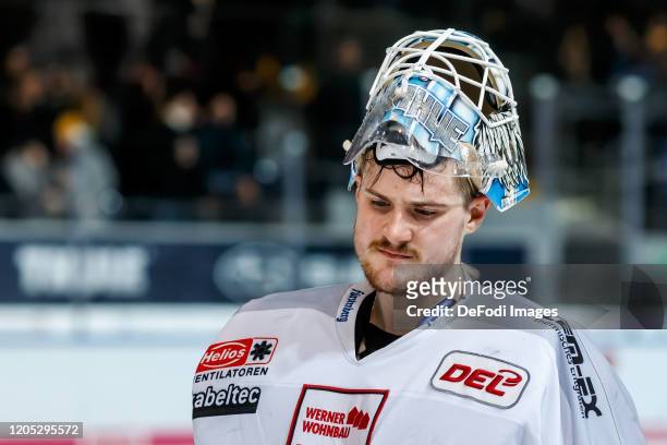 Goalkeeper Dustin Strahlmeier of Schwenninger Wild Wings looks on during the DEL match between EHC Red Bull Muenchen and Schwenninger Wild Wings at...