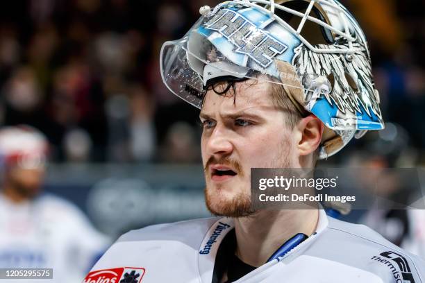 Goalkeeper Dustin Strahlmeier of Schwenninger Wild Wings looks on during the DEL match between EHC Red Bull Muenchen and Schwenninger Wild Wings at...