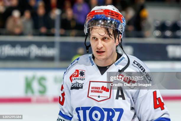 Alexander Weiss of Schwenninger Wild Wings looks on during the DEL match between EHC Red Bull Muenchen and Schwenninger Wild Wings at Olympiaeishalle...