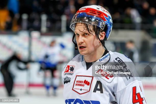 Alexander Weiss of Schwenninger Wild Wings looks on during the DEL match between EHC Red Bull Muenchen and Schwenninger Wild Wings at Olympiaeishalle...