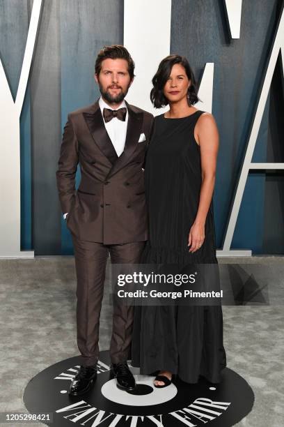 Adam Scott and Naomi Scott attend the 2020 Vanity Fair Oscar party hosted by Radhika Jones at Wallis Annenberg Center for the Performing Arts on...