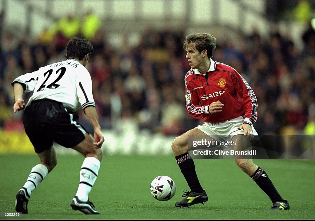 Phil Neville and Vass Borbokis