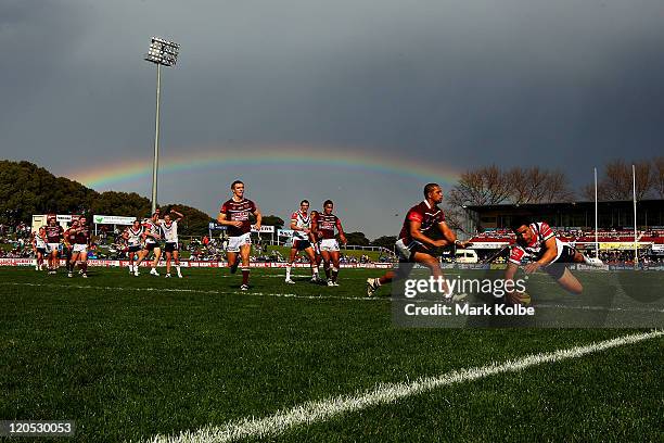 Chris Taripo of the Roosters scores a try during the round 22 Toyota Cup match between the Manly Warringah Sea Eagles and the Sydney Roosters at...