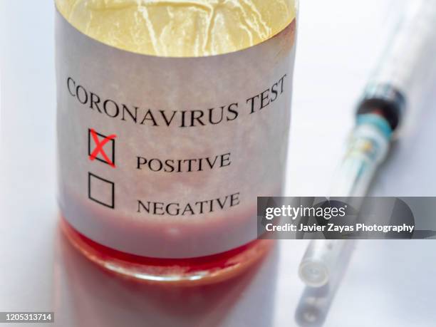 coronavirus positive blood test and syringe - crime or recreational drug or prison or legal trial fotografías e imágenes de stock