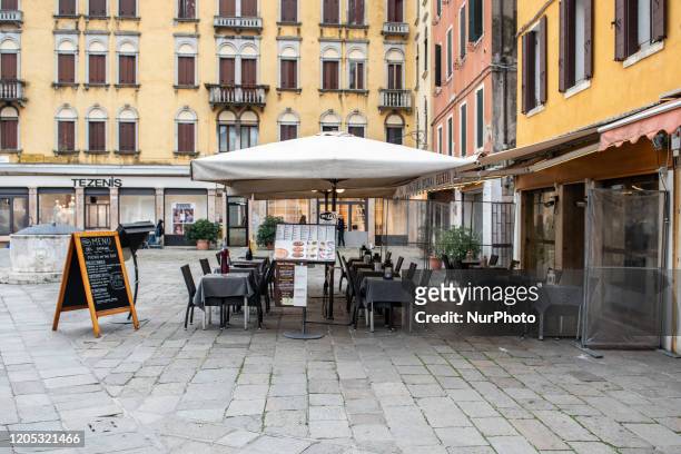 An empty restaurant in Venice, Italy on March 5, 2020. Turism in Venice collapsed after the Coronavirus emergency in Italy: the city looks empty,...