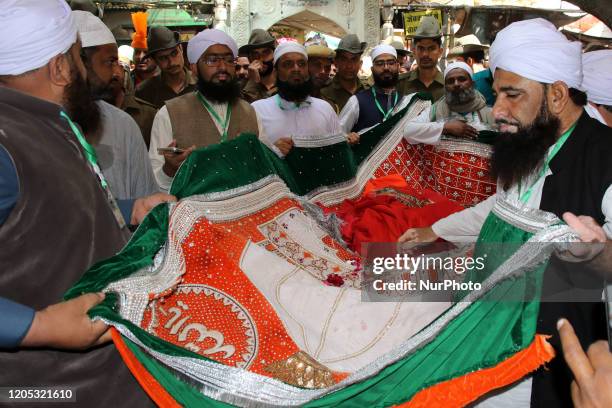 Pakistani Pilgrims offer 'Holy Chadar' at the shrine of Sufi saint Hazrat Khwaja Moinuddin chisti During end of the 'URS' festival in Ajmer,...