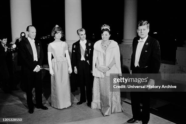 First Lady Jacqueline Kennedy, Mohammad Reza Pahlavi, Shah of Iran, Farah Pahlavi and U.S. President, John F. Kennedy, group portrait, White House,...