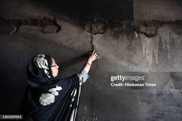 Razia seen in her burnt house after last week's violence in northeast Delhi over the Citizenship Amendment Act , at Brijpuri on March 5, 2020 in New...