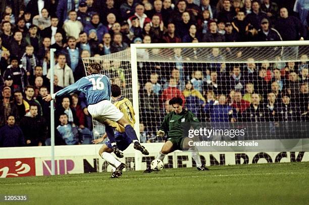 Jamie Pollock scores the fourth goal for Manchester City during the Nationwide Division One match against Portsmouth played at Maine Road,...