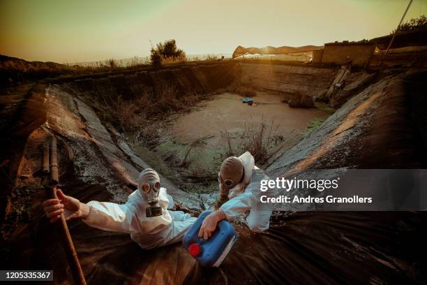 getting contaminated water to drink - dystopia - climate resilience stock pictures, royalty-free photos & images