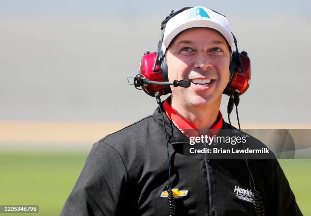 Crew chief Chad Knaus stands on the grid during qualifying for the NASCAR Cup Series 62nd Annual Daytona 500 at Daytona International Speedway on...