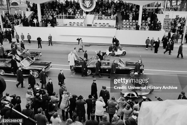 President Richard Nixon standing up through Sun Roof of Car during Presidential Inauguration Parade, Washington, D.C., USA, photograph by Thomas J....