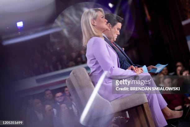 Bret Baier and Martha MacCallum wait for US President Donald Trump during a FOX News Channel town hall at the Scranton Cultural Center March 5 in...
