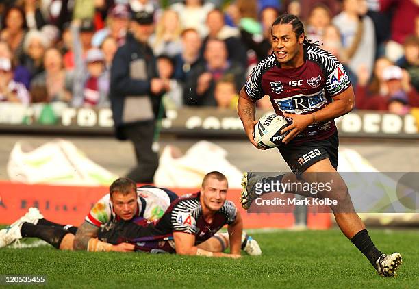 Steve Matai of the Sea Eagles crosses to score a try during the round 22 NRL match between the Manly Warringah Sea Eagles and the Sydney Roosters at...