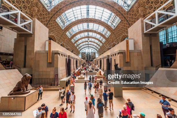 The main Hall of the Orsay Museum, Its arched form with lots of natural light is borrowed from its former life as a rail station.