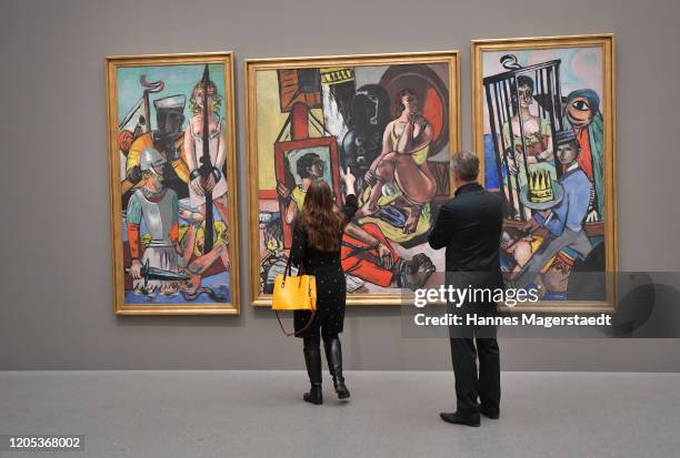 Artist, painter Neo Rauch and his wife Rosa Loy look at the pictures of Max Beckmann before he is in conversation with Bernhart Schwenk about Max...