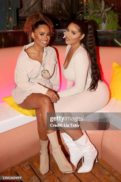 Love Island stars Amber Gill and Anna Vakili attend the Just Eat Ultimate Love Island Date Night event at Night Tales on February 10, 2020 in...