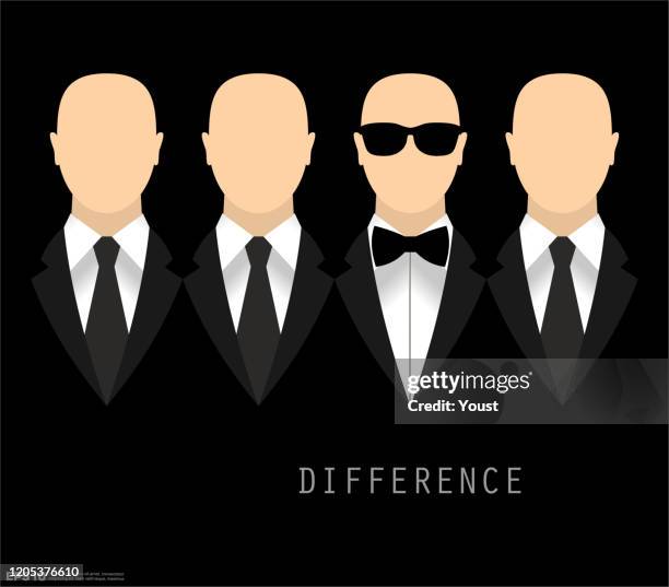 black business suit with a tie and bow tie difference concept - black suit sunglasses stock illustrations