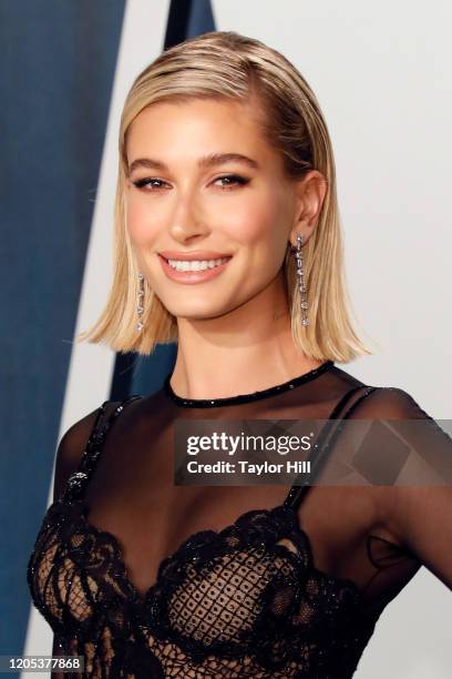 Hailey Bieber attends the Vanity Fair Oscar Party at Wallis Annenberg Center for the Performing Arts on February 09, 2020 in Beverly Hills,...
