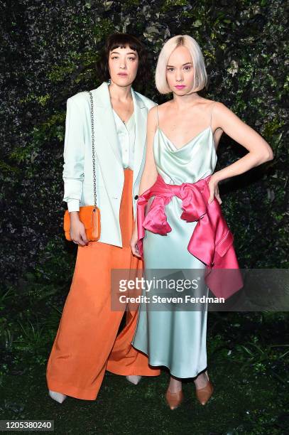 Mia Moretty and Caitlin Moe attend the Alice + Olivia By Stacey Bendet fashion show during February 2020 - New York Fashion Week: The Shows on...